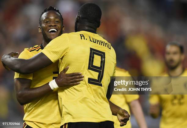 Belgium's forward Michy Batshuayi celebrates with Belgium's forward Romelu Lukaku after scoring a goal during the international friendly football...