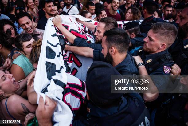 Tension in Rome, Italy, on June 11, 2018 between police and protesters demonstrating against Italian government decision to block ports to a German...