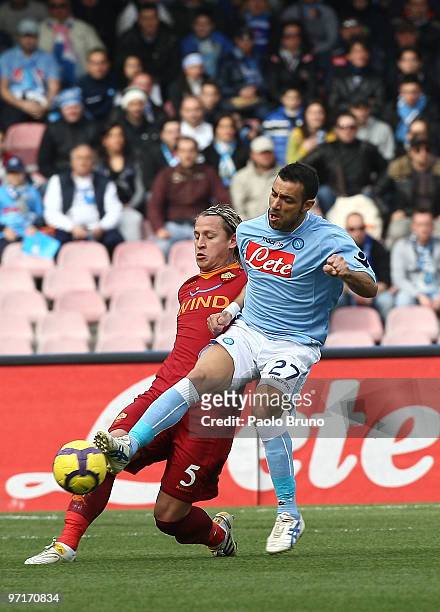 Philippe Mexes of AS Roma and Fabio Quagliarella of SSC Napoli compete for the ball during the Serie A match between Napoli and Roma at Stadio San...
