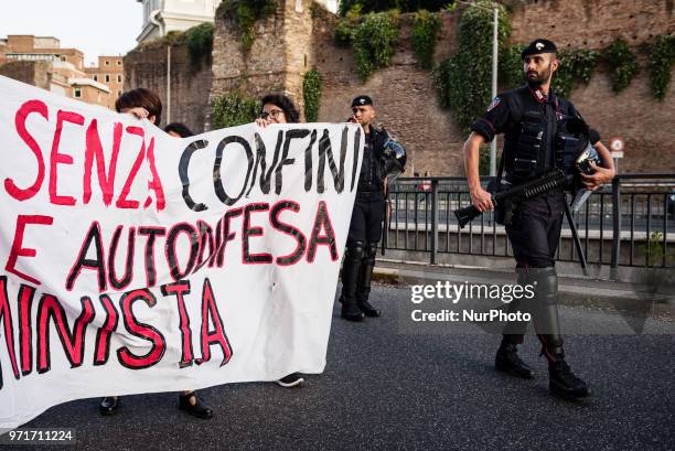Banner saying &quot;fight without border, feminist solidarity and selfdefense&quot; during a rally in Rome, Italy, on June 11, 2018 against Italian...