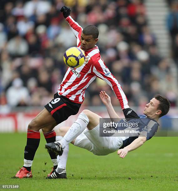 Fraizer Campball of Sunderland and Nicky Shorey of Fulham in action during the Barclays Premier League match between Sunderland and Fulham at Stadium...