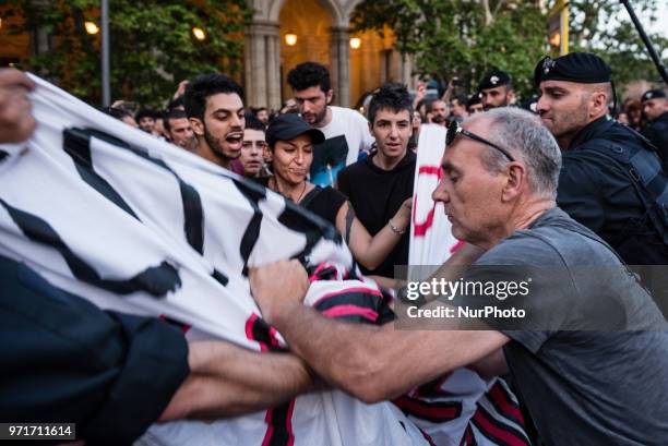 Tension in Rome, Italy, on June 11, 2018 between police and protesters demonstrating against Italian government decision to block ports to a German...