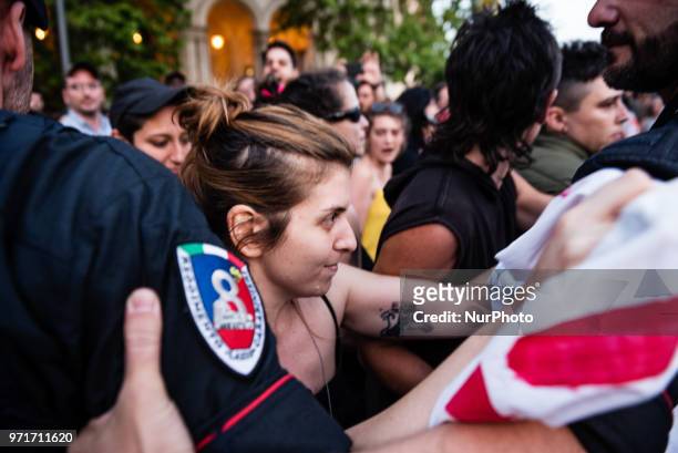 Tension in Rome, Italy, on June 11, 2018 between police and protesters demonstrating against Italian government decision to block ports to a German...