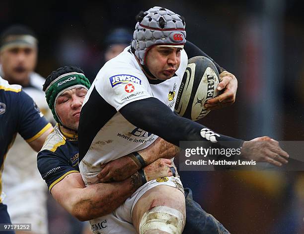 Dan Ward-Smith of Wasps is tackled by Hendre Fourie of Leeds during the Guinness Premiership match between Leeds Carnegie and London Wasps at...