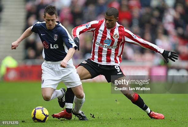 Fraizer Campball of Sunderland and Nicky Shorey of Fulham in action during the Barclays Premier League match between Sunderland and Fulham at Stadium...