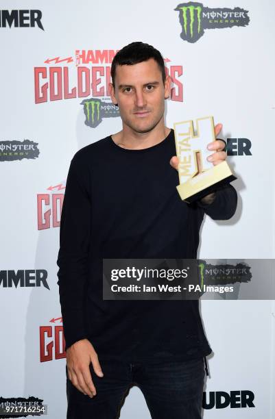 Winston McCall of Parkway Drive with the band's Defender of the Faith award at the Metal Hammer Golden Gods Awards 2018 held at indigo at The O2 in...