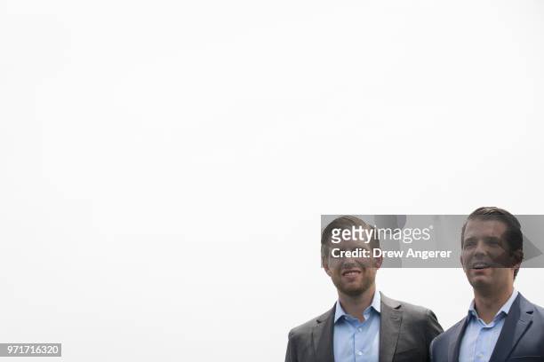 Eric Trump and Donald Trump Jr. Attend a ribbon cutting event for a new clubhouse at Trump Golf Links at Ferry Point, June 11, 2018 in The Bronx...
