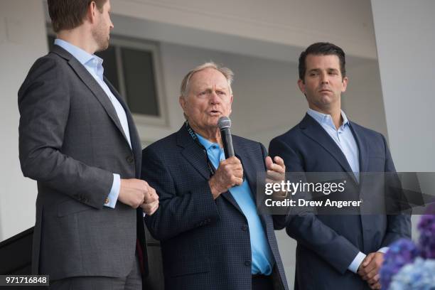 Flanked by Eric Trump and Donald Trump Jr. , golfing legend Jack Nicklaus speaks during a ribbon cutting event for a new clubhouse at Trump Golf...