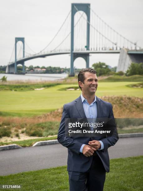 Donald Trump Jr. Poses for photos during a ribbon cutting event for a new clubhouse at Trump Golf Links at Ferry Point, June 11, 2018 in The Bronx...
