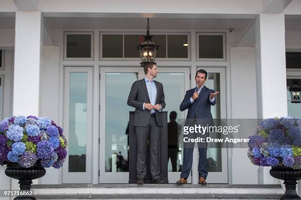Eric Trump and Donald Trump Jr. Speak during a ribbon cutting event for a new clubhouse at Trump Golf Links at Ferry Point, June 11, 2018 in The...