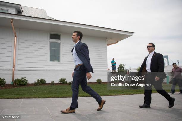 Donald Trump Jr. Arrives for a ribbon cutting event for a new clubhouse at Trump Golf Links at Ferry Point, June 11, 2018 in The Bronx borough of New...