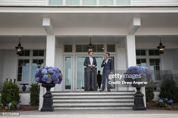 Eric Trump and Donald Trump Jr. Speak during a ribbon cutting event for a new clubhouse at Trump Golf Links at Ferry Point, June 11, 2018 in The...