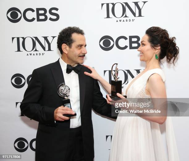 Tony Shalhoub and Katrina Lenk pose in the 72nd Annual Tony Awards Press Room at 3 West Club on June 10, 2018 in New York City.