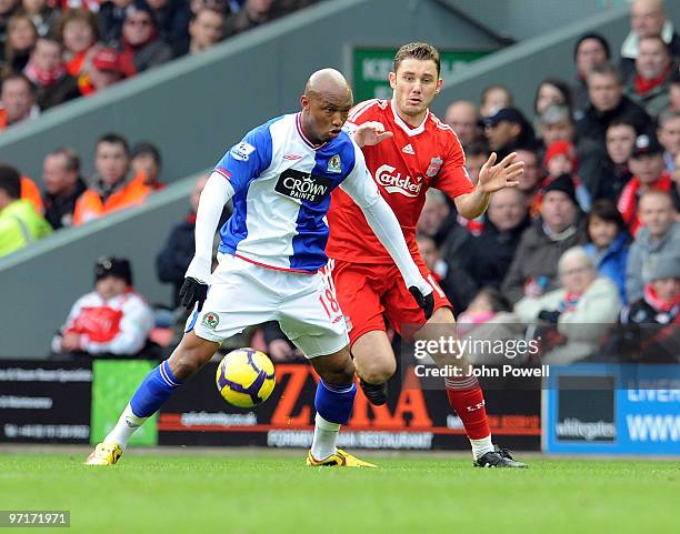 Fabio Aurelio of Liverpool competes with El Hadji Diouf of Blackburn Rovers during a Barclays Premier League game between Liverpool and Blackburn...