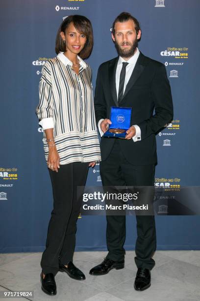 Actress Sonia Rolland and Chris Overton attend the 'Les Nuits En Or 2018' dinner gala at UNESCO on June 11, 2018 in Paris, France.