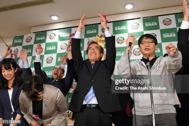 Hideyo Hanazumi, a candidate backed by the Liberal Democratic Party and Komeito, celebrates his election victory on June 10, 2018 in Niigata, Japan....