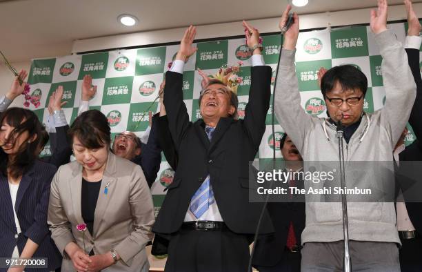 Hideyo Hanazumi, a candidate backed by the Liberal Democratic Party and Komeito, celebrates his election victory on June 10, 2018 in Niigata, Japan....