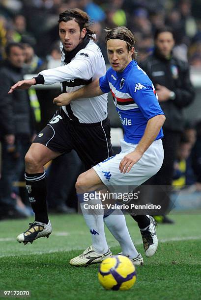Christian Zaccardo of Parma FC is challenged by Reto Ziegler of UC Sampdoria during the Serie A match between Parma FC and UC Sampdoria at Stadio...