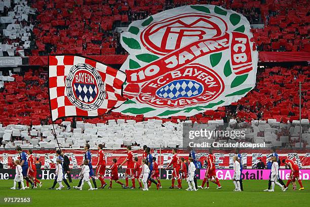 The fans of Bayern show a presentation of the 110th anniversary before the Bundesliga match between FC Bayern Muenchen and Hamburger SV at Allianz...