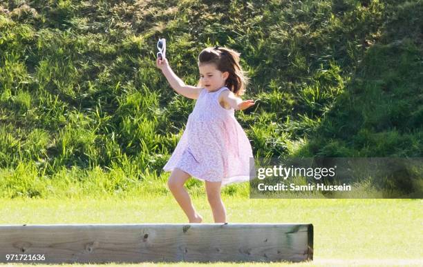 Princess Charlotte of Cambridge attends the Maserati Royal Charity Polo Trophy at Beaufort Park on June 10, 2018 in Gloucester, England.