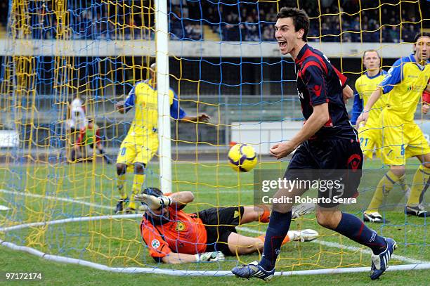 Davide Astori of Caglieri celebrate during the Serie A match between Chievo and Cagliari at Stadio Marc'Antonio Bentegodi on February 28, 2010 in...