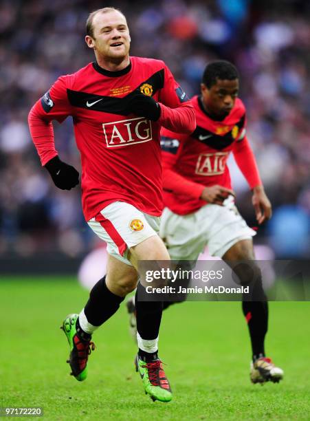 Wayne Rooney of Manchester United celebrates with Patrice Evra as he scores their second goal during the Carling Cup Final between Aston Villa and...