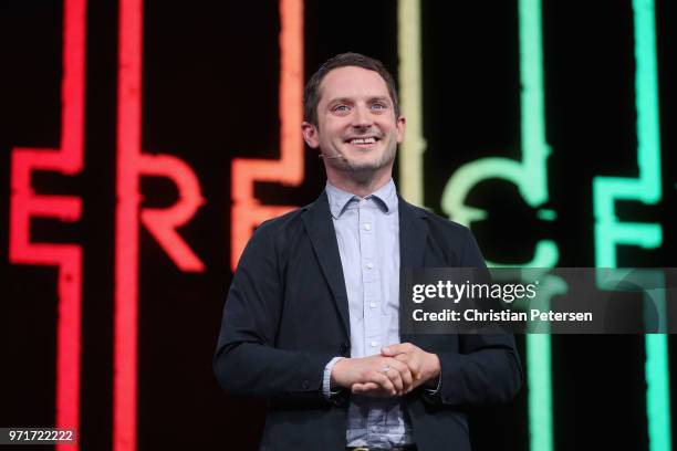 Elijah Wood, Actor and Creative Director at Spectrrevision, speaks during the Ubisoft E3 conference at the Orpheum Theater on June 11, 2018 in Los...