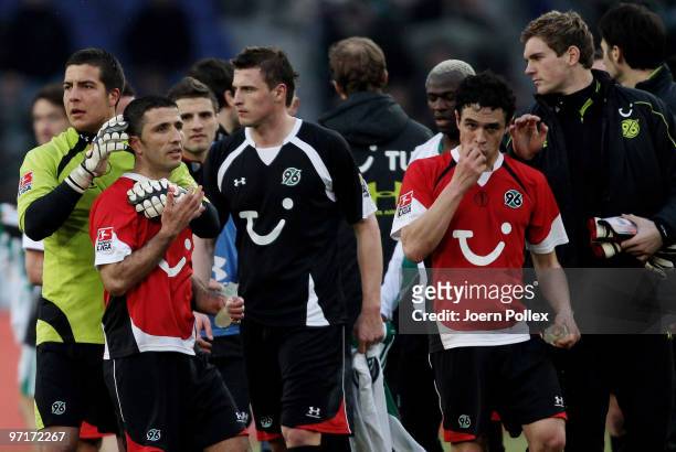Player of Hannover look dejected after the Bundesliga match between Hannover 96 and VfL Wolfsburgat AWD-Arena on February 28, 2010 in Hanover,...