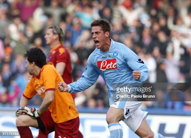 German Gustavo Denis of SSC Napoli celebrates the first goal as Alexander Doni the goalkeeper of AS Roma shows his dejection during the Serie A match...