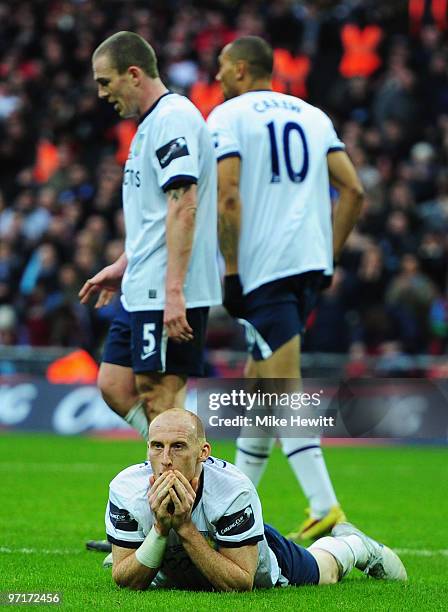Grounded James Collins of Aston Villa looks dejected during the Carling Cup Final between Aston Villa and Manchester United at Wembley Stadium on...