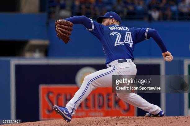 Toronto Blue Jays Pitcher Danny Barnes pitches relief during the MLB game between the Baltimore Orioles and the Toronto Blue Jays at Rogers Centre in...