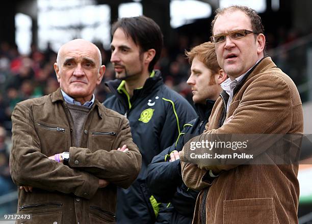 President Martin Kind and manager Joerg Schmadtke look on prior to the Bundesliga match between Hannover 96 and VfL Wolfsburgat AWD-Arena on February...