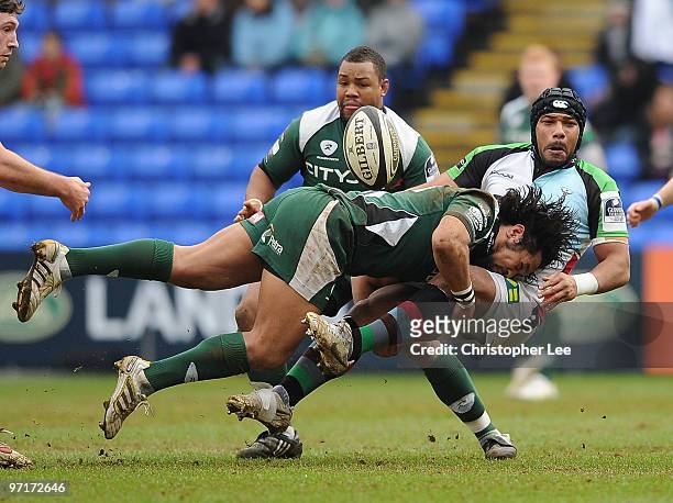 Jordan Turner-Hall of Quins is tackled by Seilala Mapusua of Irish during the Guinness Premiership match between London Irish and Harlequins at the...