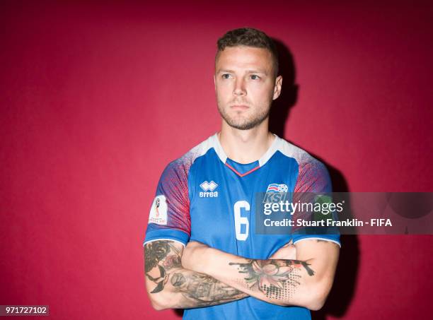 Ragnar Sigurdsson of Iceland poses for a picture during the official FIFA World Cup 2018 portrait session at on June 11, 2018 in Gelendzhik, Russia.