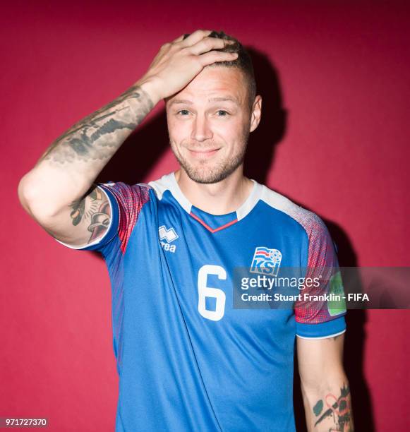 Ragnar Sigurdsson of Iceland poses for a picture during the official FIFA World Cup 2018 portrait session at on June 11, 2018 in Gelendzhik, Russia.