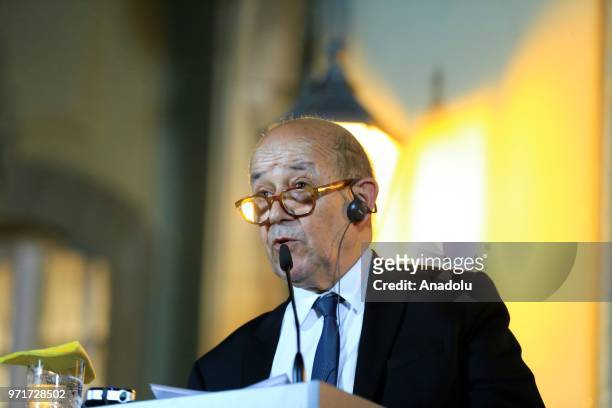 French Foreign Minister Jean-Yves Le Drian speaks during a joint press conference following a Normandy format meeting with German Foreign Minister...