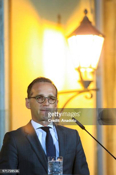 German Foreign Minister Heiko Maas speaks during a joint press conference following a Normandy format meeting with French Foreign Minister Jean-Yves...