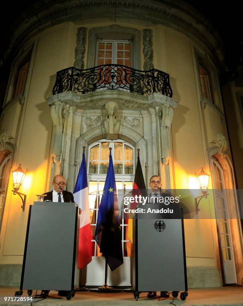 German Foreign Minister Heiko Maas speaks next to French Foreign Minister Jean-Yves Le Drian during a joint press conference following their Normandy...