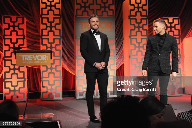 Hosts Gus Kenworthy and Adam Rippon speak onstage during The Trevor Project TrevorLIVE NYC at Cipriani Wall Street on June 11, 2018 in New York City.