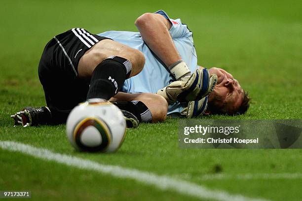 Goalkeeper Frank Rost of Hamburg lies injured on the pitch during the Bundesliga match between FC Bayern Muenchen and Hamburger SV at Allianz Arena...