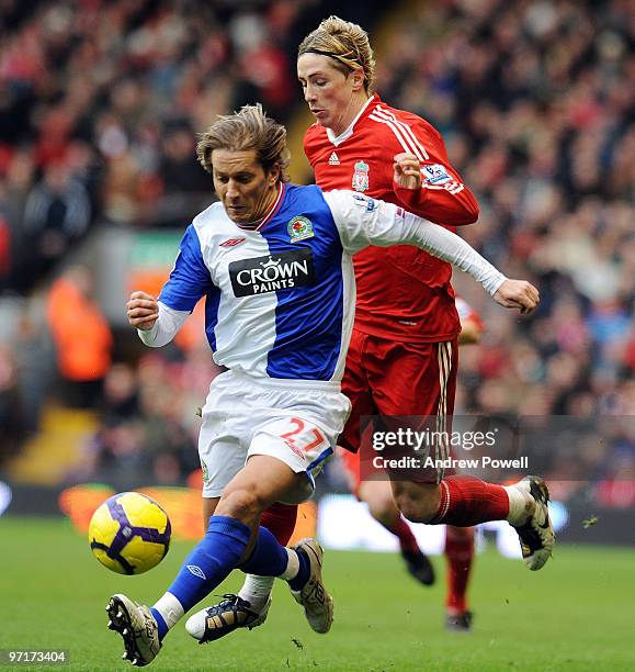 Fernando Torres of Liverpool competes with Michel Salgado of Blackburn Rovers during a Barclays Premier League game between Liverpool and Blackburn...