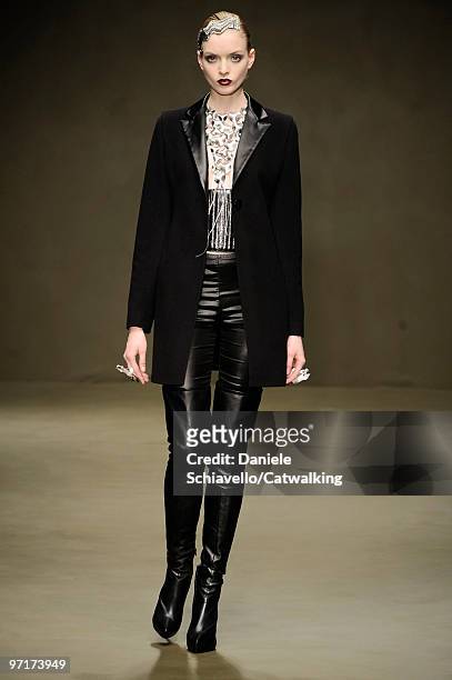 Model walks the runway at the Krizia show during Milan Fashion Week Autumn/Winter 2010 on February 25, 2010 in Milan, Italy .