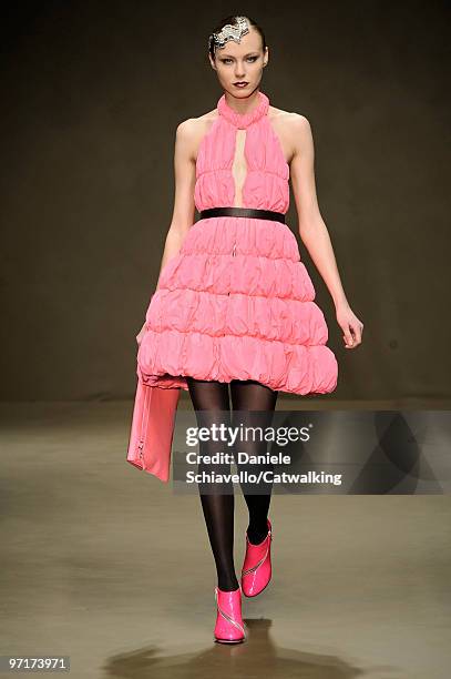 Model walks the runway at the Krizia show during Milan Fashion Week Autumn/Winter 2010 on February 25, 2010 in Milan, Italy .