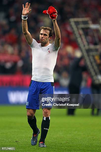 Joris Mathijsen of Hamburg looks dejected after losing 0-1 the Bundesliga match between FC Bayern Muenchen and Hamburger SV at Allianz Arena on...