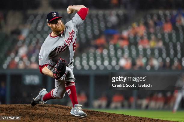 Sean Doolittle of the Washington Nationals pitches against the Baltimore Orioles during the ninth inning at Oriole Park at Camden Yards on May 30,...