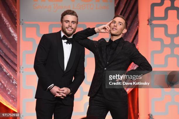 Hosts Gus Kenworthy and Adam Rippon speak onstage during The Trevor Project TrevorLIVE NYC at Cipriani Wall Street on June 11, 2018 in New York City.