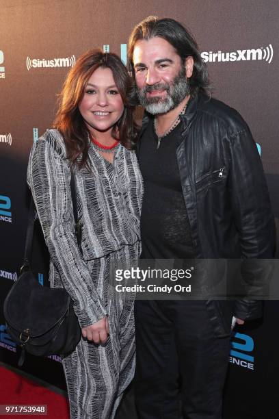 Rachael Ray and John M. Cusimano attend SiriusXM's private concert with U2 at The Apollo Theater as the band takes a one night detour from the...