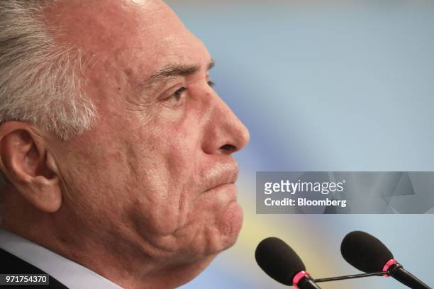 Michel Temer, Brazil's president, pauses while speaking during an event to announce the unification of the Brazilian security system at the Planalto...