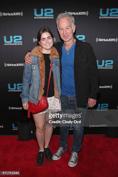 Ava McEnroe and John McEnroe attend SiriusXM's private concert with U2 at The Apollo Theater as the band takes a one night detour from the eXPERIENCE...