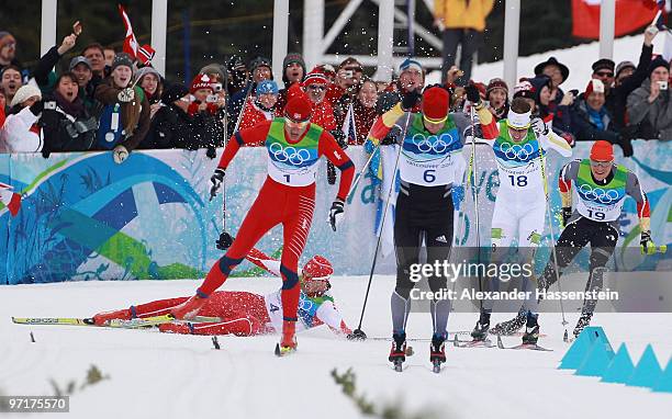 Petter Northug of Norway heads down the final straight on his way to winning the gold medal during the Men's 50 km Mass Start Classic cross-country...